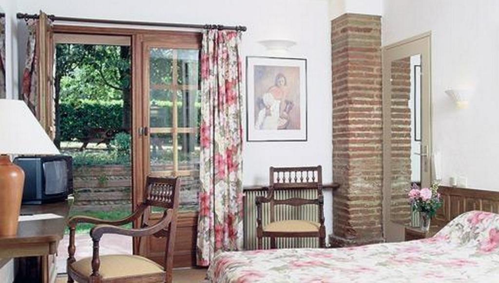 Готель Le Ratelier Montaigut-sur-Save Номер фото